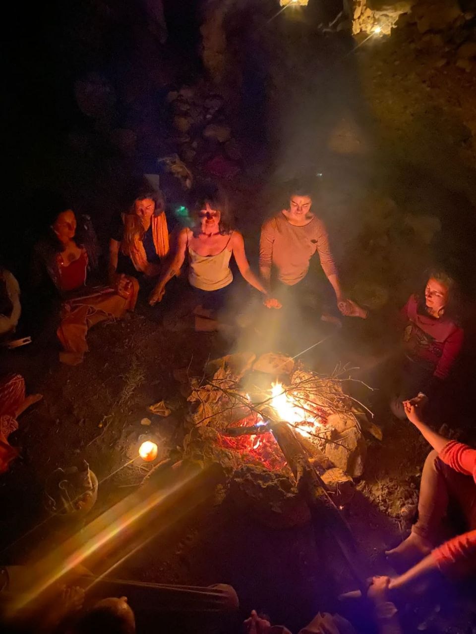Women gathering around fire